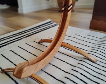 Cherry wood bike stand with inlays of Wenge, figured Maple, and Blood wood.  This upright bicycle stand makes a great gift for cyclists!