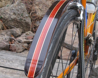 Wood bicycle fender hand made from Wenge and Blood wood.  Great addition to any bicycle to keep the muddy stripe of your back.