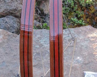 Wood bicycle fenders made from Leopard wood with a Blood wood center stripe.  Stainless steel and brass hardware finished with Marine Poly.