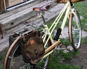 Wood bicycle fenders made from Maple, Wenge, and Sapele wood.  Fenders come with all stainless steel mounting hardware.