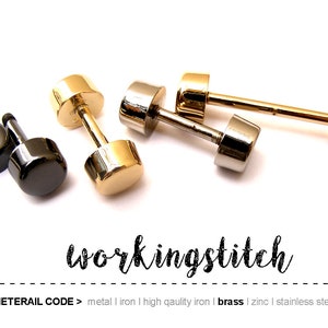 May include: Four metal hardware pieces in different finishes: gold, silver, and black. The hardware is used for sewing and crafting projects.  The text "METERAIL CODE > metal | iron | high qaulity iron | brass | zinc | stainless steel" is visible below the hardware.