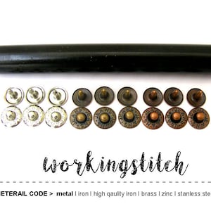 May include: Assortment of metal rivets in various finishes, including silver, brass, and copper. The rivets are arranged in rows on a white background. A black tool for setting the rivets is also included. The text "workingstitch" and "METERAIL CODE > metal | iron | high quality iron | brass | zinc | stainless steel" is visible below the rivets.