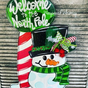 Snowman at the North Pole Wood Cut Out Door Hanger