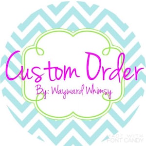 May include: A white circle with a light blue chevron pattern. Inside the circle is a green and white frame with a pink cursive text that says "Custom Order By: Wayward Whimsy".