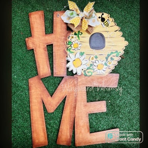 Home with beehive door hanger