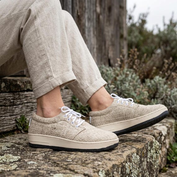 white canvas slip white slip on plimsolls