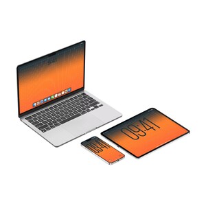 May include: A silver laptop, a tablet, and a smartphone arranged together. Each device features a vibrant orange and black gradient wallpaper with the time 9:41 displayed on the screens. The laptop is open, showing a keyboard and dock.