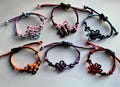Handmade K-Pop Knot Bracelet – Adjustable Fandom Gift | Seventeen, Blackpink, Straykids, Ateez, Rumi Jinu Kpop Demon Hunter Inspired product logo