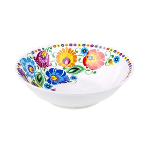 Può includere: Ciotola in ceramica bianca con un vivace motivo floreale. La ciotola presenta un motivo colorato di fiori nelle tonalità del blu, viola, arancione e rosso, con foglie verdi. Il bordo è decorato con piccoli accenti floreali colorati. Una ciotola decorativa.