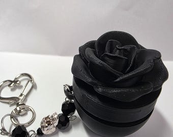 Black rose Medicine keychain.