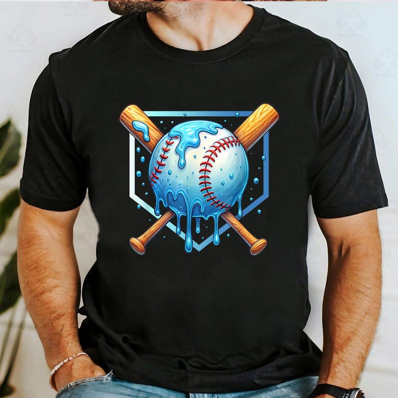 May include: Black t-shirt featuring a baseball design. The graphic shows a baseball with blue dripping accents, red stitching, and crossed wooden bats. The design is set against a blue and white shield.