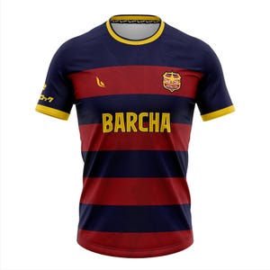 May include: A navy blue and maroon striped soccer jersey with yellow accents. The jersey features the word "BARCHA" in large yellow letters across the front, along with a team crest and Japanese text on the sleeve.