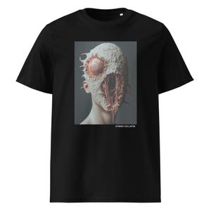May include: Black t-shirt with a graphic print of a person's face with a large eye and a fleshy, textured mouth. The text "HYBRID COLLAPSE" is printed below the image.