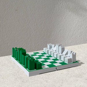 Mini juego de ajedrez plegable: diseño portátil y moderno, ideal para viajes.