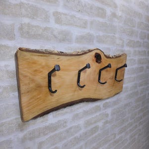 Handmade Sycamore Coat Rack: Rustic Wrought Iron Hooks, Natural Edge