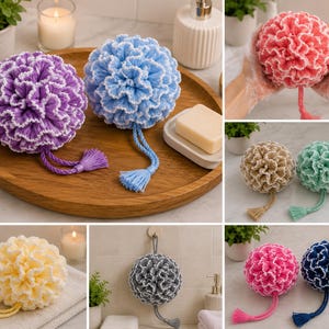 May include: A collection of round, crocheted bath sponges featuring ruffled, flower-like textures with white-edged petals. Each sponge includes a matching braided cord and tassel for hanging, available in various solid colors like purple, blue, pink, and yellow.