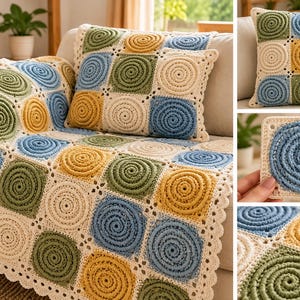 May include: A crochet blanket and matching square pillow featuring a repeating pattern of cream, blue, olive green, and mustard yellow yarn squares. Each square contains a raised circular spiral design, joined by cream borders with a scalloped edge.