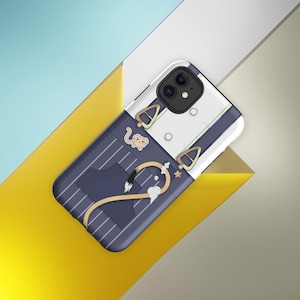 May include: A smartphone case featuring a dark blue pinstriped design with a white upper section. The case displays printed illustrations of tan suspenders with gold buckles, a small cartoon animal, and a curved tan ribbon with a black tip.