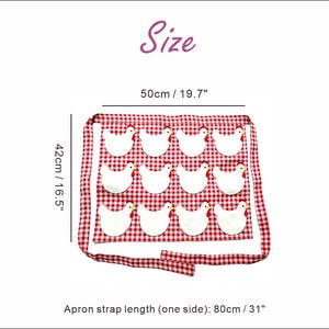 May include: A red and white gingham apron featuring twelve white chicken appliqu&eacute;s with red combs. The apron measures 50 cm wide by 42 cm long, with a strap length of 80 cm on one side. The text Size is displayed above the apron.