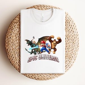 Camiseta Comfort Colors Epic Universe, Camiseta Mario Donkey Kong Toothless, Camiseta Universal Studios Family Trip, Camiseta Nintendo Adventure Vacation