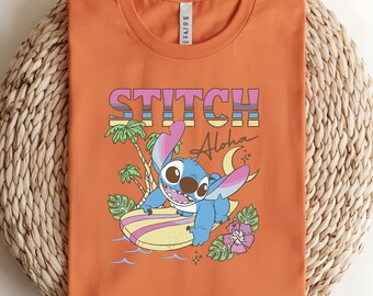 Camiseta Disney Stitch Aloha Tropic Surf, Camiseta Disney Stitch Aloha, Camiseta Stitch, Camiseta Ohana Means Family, Camiseta Magic Kingdom, Camiseta Hawái