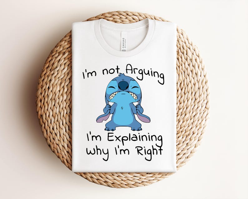May include: White t-shirt featuring a cartoon image of Stitch with the text "I'm not Arguing, I'm Explaining Why I'm Right." The design includes a blue Stitch character with a grumpy expression.