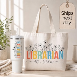 May include: A white tumbler and a canvas tote bag. The tumbler has a floral design and the word "Librarian" in colorful letters. The tote bag also says "Librarian" with a floral design, and the name "Ms. Wilson".