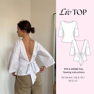 Peut inclure: Un haut blanc à manches trois-quarts avec un dos nu profond et un nœud. Le graphique présente le patron Liv TOP avec des vues avant et arrière, incluant des fichiers PFD et Adobe, des instructions de couture et les tailles EU 34-44.