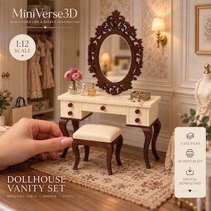 May include: A 1:12 scale dollhouse vanity set featuring a cream-colored dressing table with five small drawers, a dark brown ornate oval mirror, and a matching stool with a cream cushion. The set includes digital download text for 3 STL files.