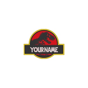 May include: Embroidered patch with a black dinosaur silhouette on a red background, within a yellow-bordered circle. Below, a black rectangle with the text "YOUR NAME" in white. Suitable for application on clothing or accessories.