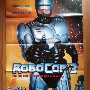 ロボコップ出演者サイン入り写真2枚 - ピーター・ウェラー、ナンシー