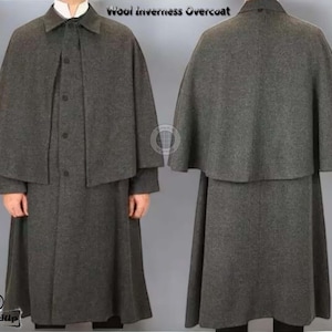 May include: A charcoal gray wool Inverness overcoat with a cape-like design. The coat features a button-down front and a collar. The image shows both the front and back of the coat, highlighting its unique silhouette. The text "Wool Inverness Overcoat" is visible.