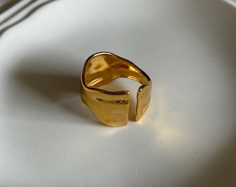 Anillo abstracto dorado, resistente al agua, ajustable, de acero inoxidable.
