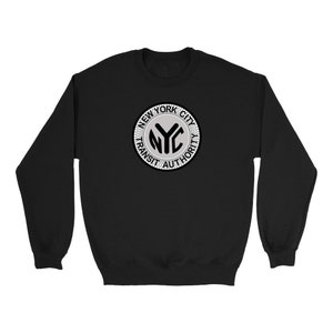 May include: Black sweatshirt with a white and gray circular logo that says "New York City Transit Authority" with the letters "NYC" in the center.