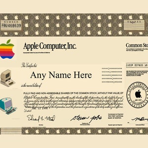 May include: A vintage stock certificate for Apple Computer, Inc. The certificate is beige with a brown border and a pattern of small apples. The certificate number is FBU 468639. The certificate is dated December 12, 1999 and signed by Edward S. Stead, Steven Jobs, and M. Zappa.