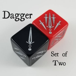 May include: Set of two black and red dice with silver dagger symbols. The dice are labelled "Dagger" and "Set of Two".