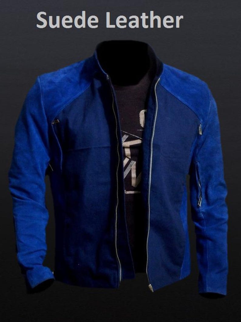 May include: A blue suede leather jacket with a zip-up front and a stand-up collar. The jacket has a two-tone design, with a darker blue on the body and a lighter blue on the shoulders and sleeves. The text "Suede Leather" is at the top.