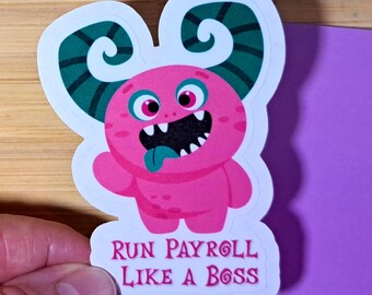 May include: A pink monster sticker with green and white accents. The monster has large eyes, a wide grin, and a blue tongue. The sticker reads "RUN PAYROLL LIKE A BOSS" in purple text.