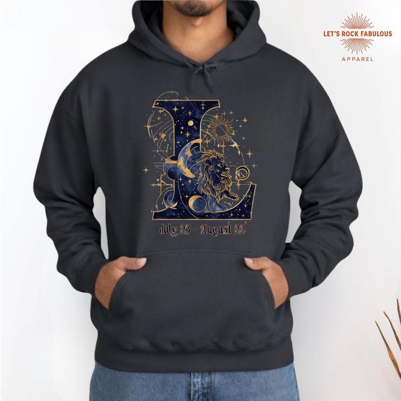 Leo Zodiac Sign celestial lion graphic on a soft Gildan hoodie featuring gold moon phases, stars, and cosmic artwork with July 23–August 22 text. Astrology-inspired graphic tee available in multiple colors and sizes S to 3XL. Perfect gift for Leo birthdays, horoscope lovers, and boho celestial fashion.