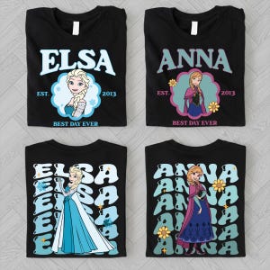 four black t-shirts with the character Elsa from the Disney movie Frozen. Each t-shirt features a different design, including a repeated pattern of the character's name and the year 2013, as well as a different illustration of Elsa.