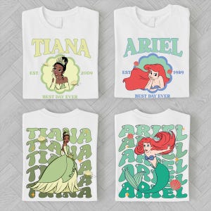 four white t-shirts with the characters Tiana and Ariel from Disney's animated films. The t-shirts feature the characters in various poses and designs, with the text "EST. 2009" and "BEST DAY EVER" printed on them.