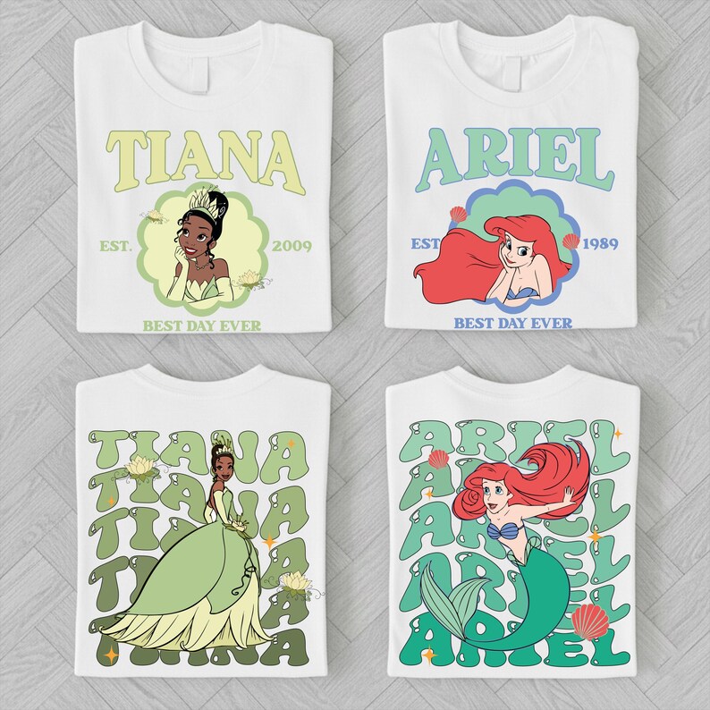 four white t-shirts with the characters Tiana and Ariel from Disney's animated films. The t-shirts feature the characters in various poses and designs, with the text "EST. 2009" and "BEST DAY EVER" printed on them.