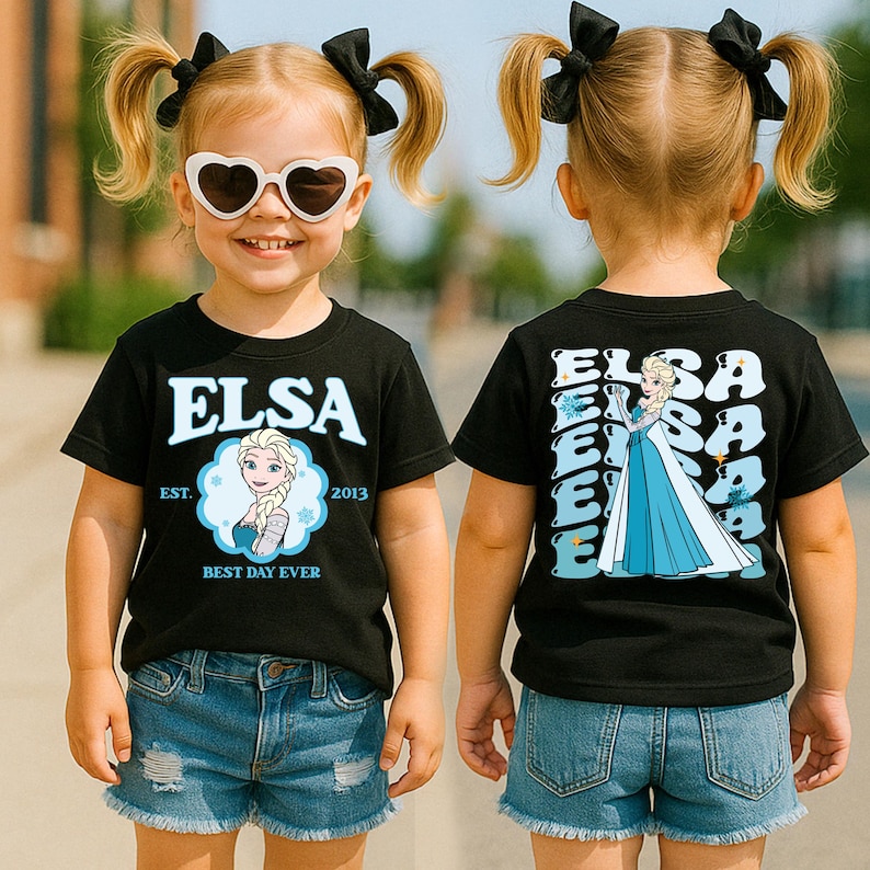 A young girl wearing a black t-shirt with a character from the Disney movie Frozen, sunglasses, and denim shorts.