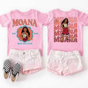 a pink t-shirt with the character Moana printed on it, along with matching shorts and a pair of black and white checkered shoes.
