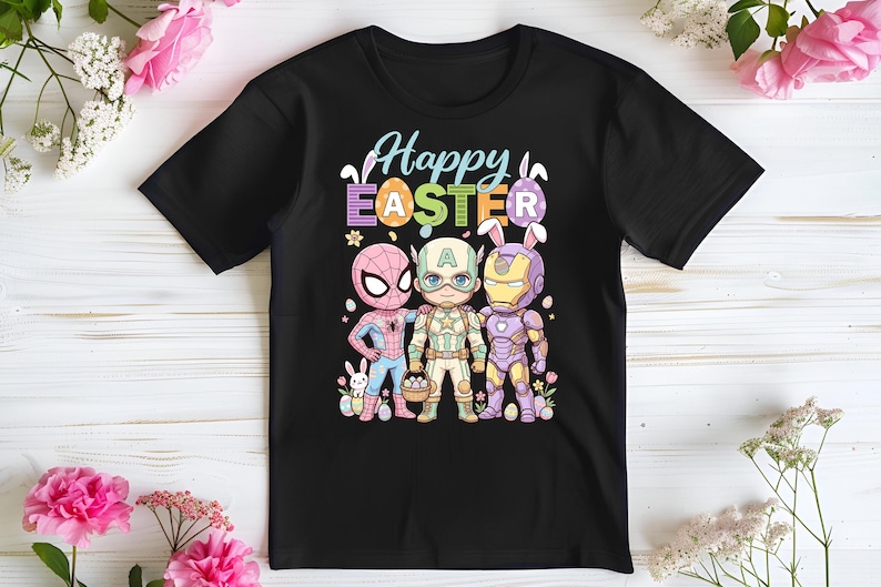 A black t-shirt with a colorful graphic design featuring three cartoon characters - Spider-Man, Captain America, and Iron Man - along with Easter eggs and flowers.
