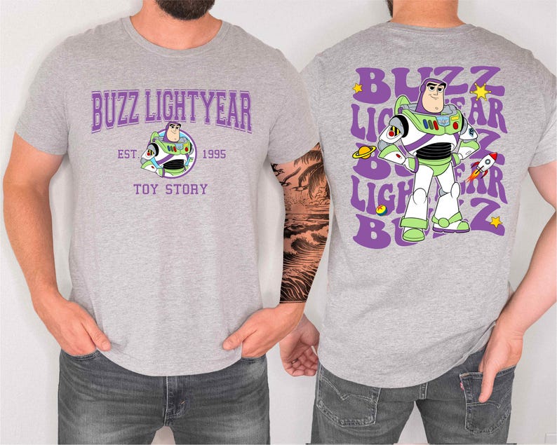 a man wearing a gray t-shirt with a design of Buzz Lightyear from the Toy Story franchise.