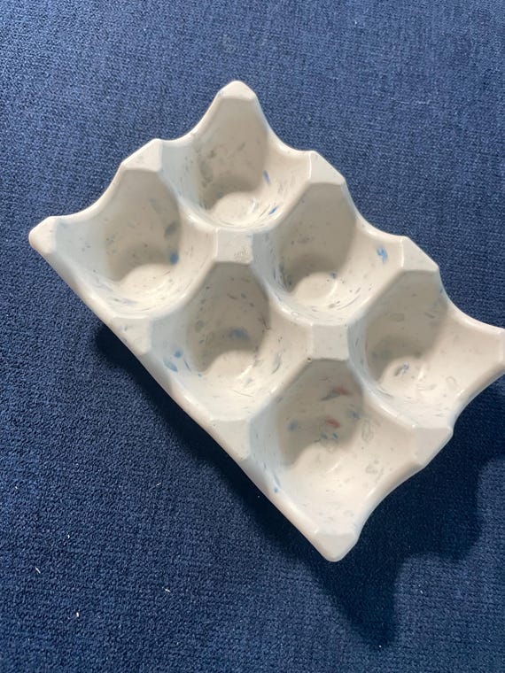 Gypsum egg or jewelry holder, white with specks of blue and terracotta