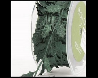 May include: A spool of green velvet ribbon with a holly leaf design. The ribbon is on a clear plastic spool with a green label that says "May Arts" and "Easy Tear Ribbon".