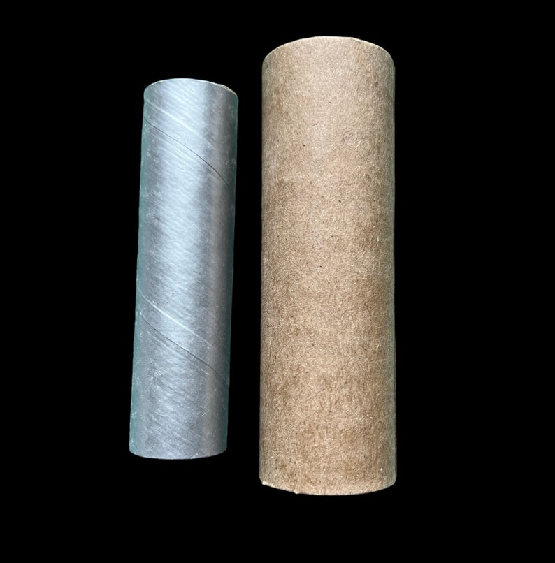 May include: Two cardboard tubes, one is brown and the other is silver.
