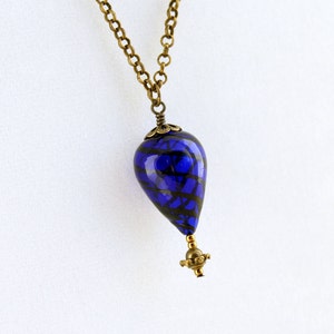 Blue hot air balloon necklace with a brass gondola below - hot air balloon jewelry - steampunk jewelry